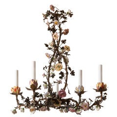 Painted tole chandelier with polychrome porcelain flowers