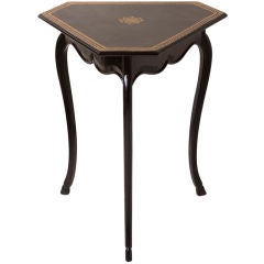 Vintage Ebonized triangle table with curved legs and black leather  top