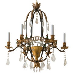 A painted iron and gilt tole Bagues style chandelier