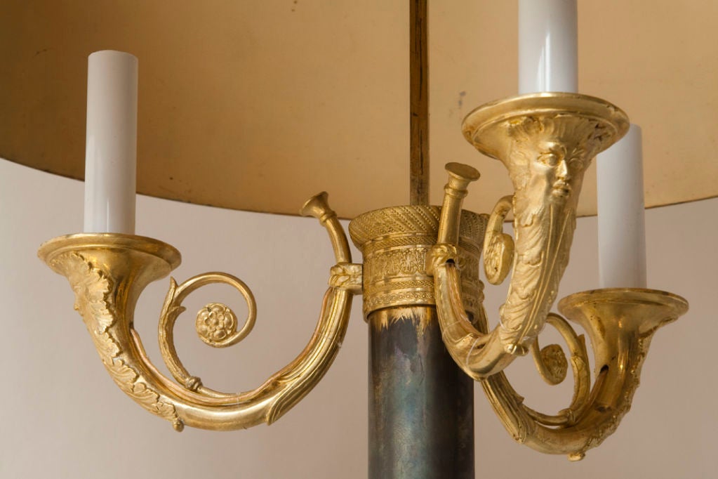 Empire style gilt and patinated bronze standing lamp