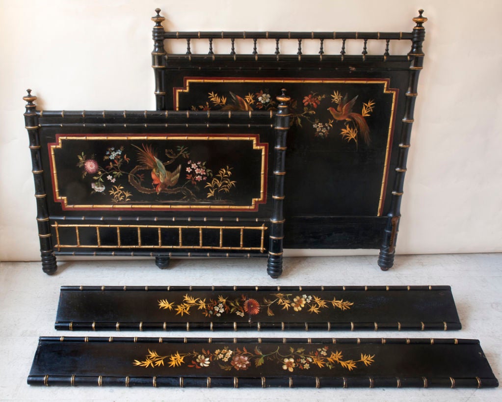 A very fine Napoleon III black lacquer and polychrome painted bed, faux bamboo with a bird and floral decoration, French, c.1870, as is