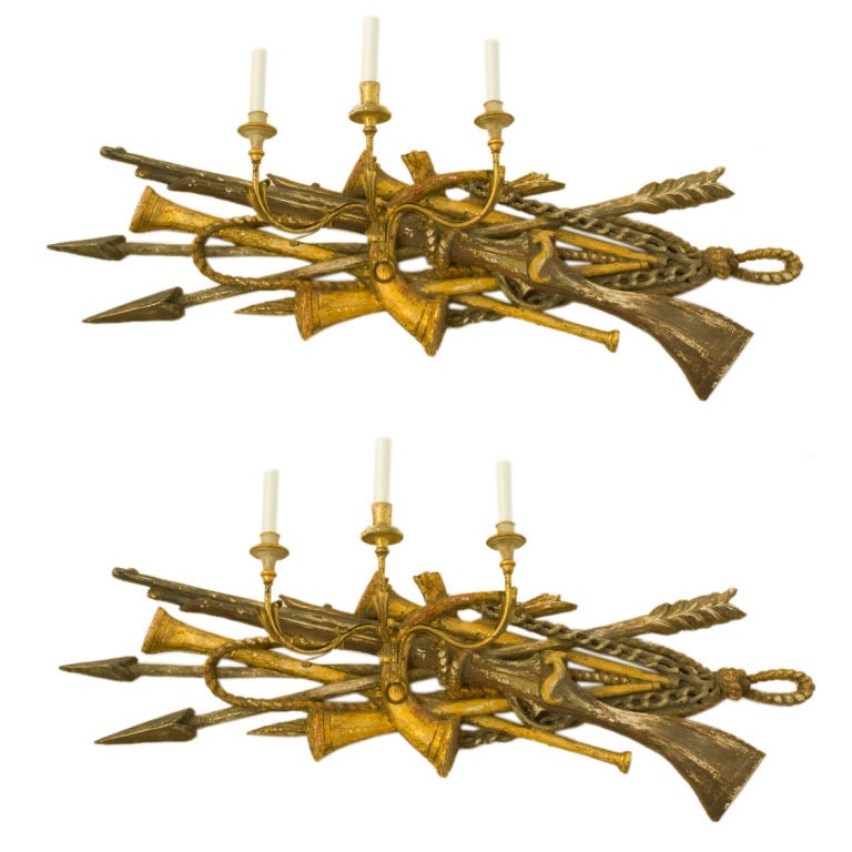 A pair of carved trophy 3 arm sconces For Sale