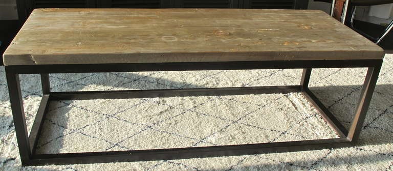 Iron base with reclaimed wood top can be made in custom sizes and materials.