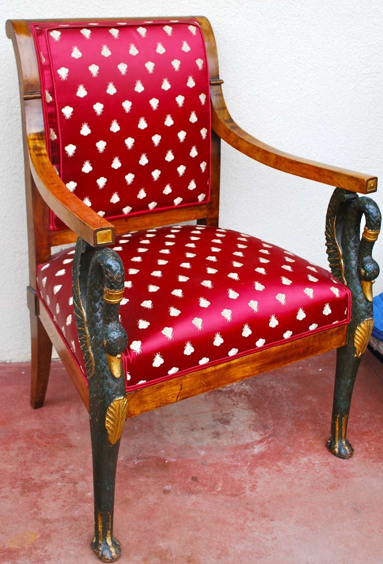19th C French Mahogany Empire Chair with carved and painted swan designs on supporting the arms. Back is slightly curved back. Upholstery is 