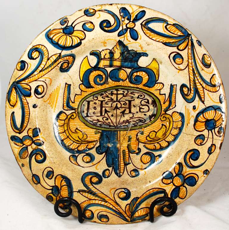 Very nice early Spanish plate from Talavera or Puente de Arzobispo. Nearly an identical one can be found in Anthony Rays's book on Spanish pottery.