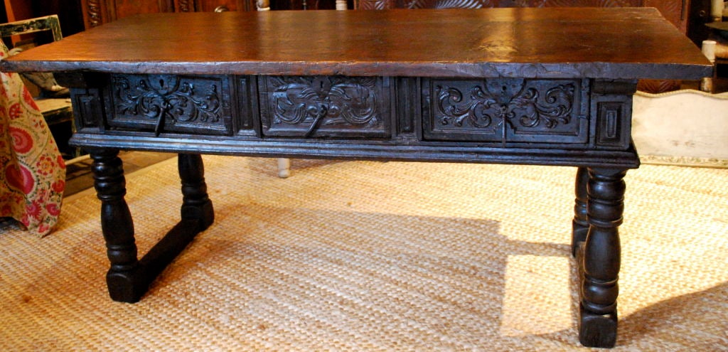 A truly beautiful 17th Century Spanish Chestnut console table. Gorgeous carving on the drawers with an outstanding patina. Iron pulls and lock plates.<br />
<br />
<br />
<br />
<br />
<br />
<br />
Haskell Antiques-Specializes in rare 16th,