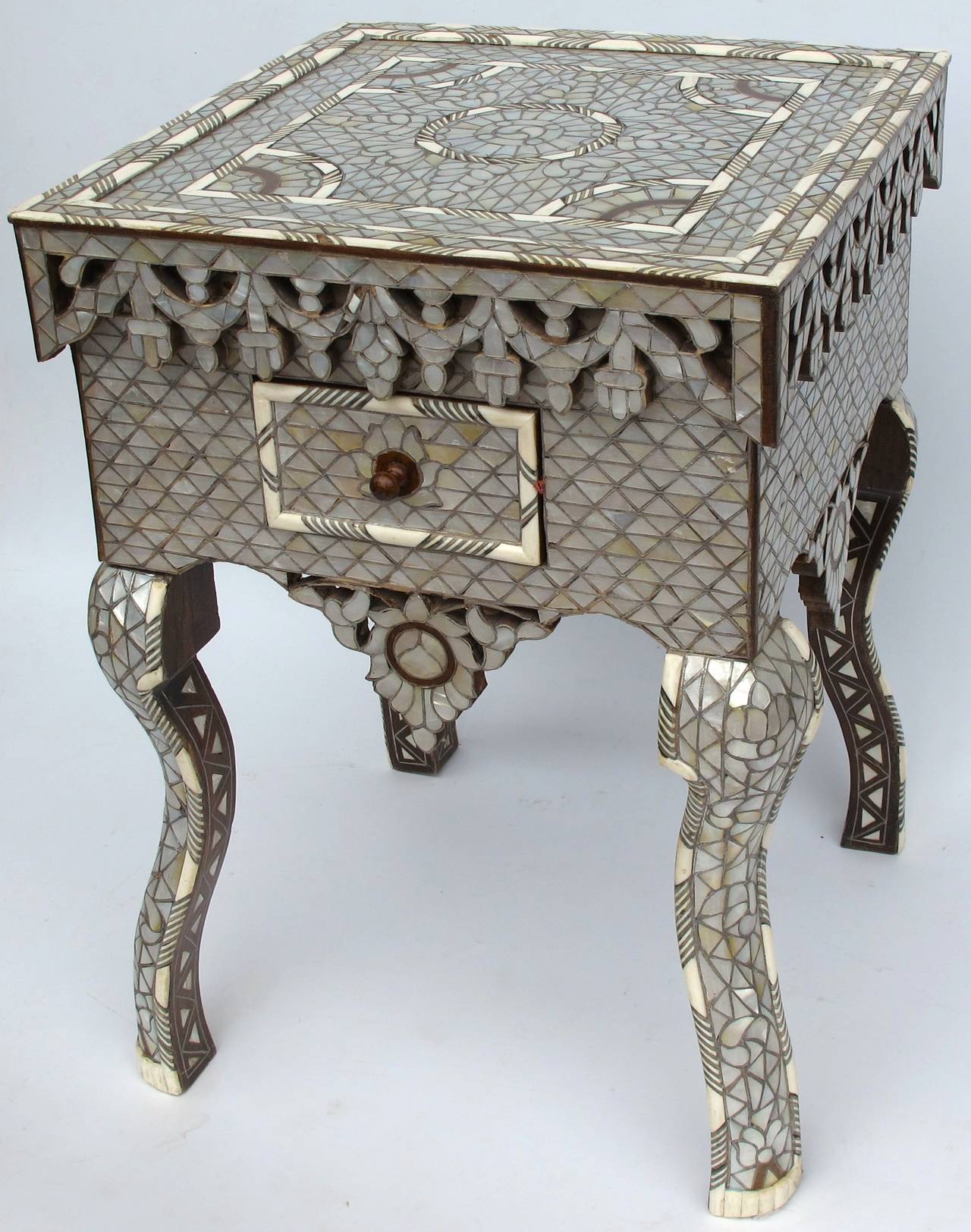 Beautiful pair of Syrian mother-of-pearl inlay side tables with single drawers. Can be sold separate.