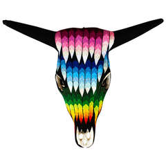 Yarn adorned Huichol Cow Skull Sculpture "Feathers"