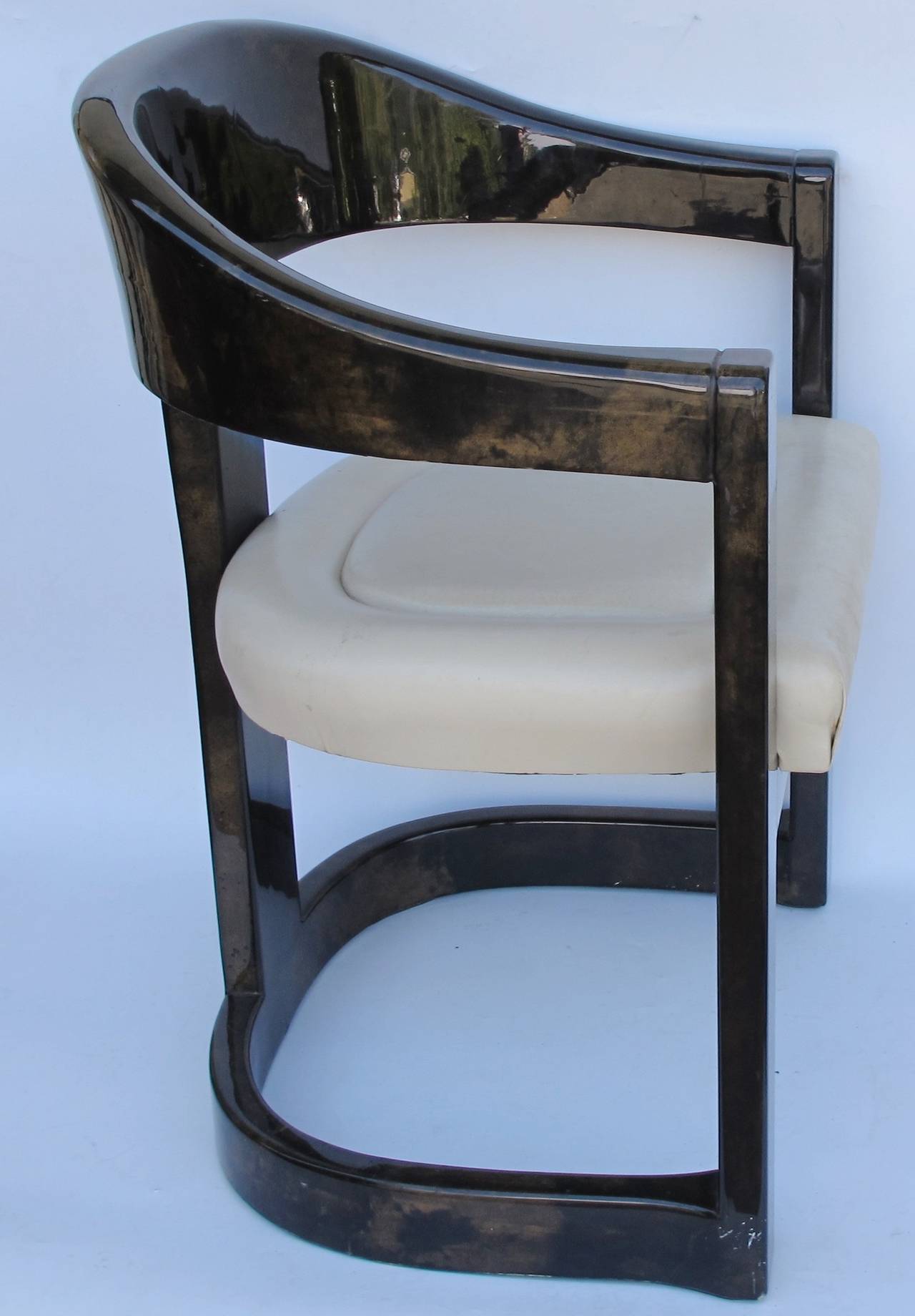 Set of four goatskin lacquered chairs by Karl Springer. His iconic "Onassis" Chairs. This incredible set was custom-made along with a dining table and console for the home of Tennis legend Bjorn Borg in the early 1980s. They have the