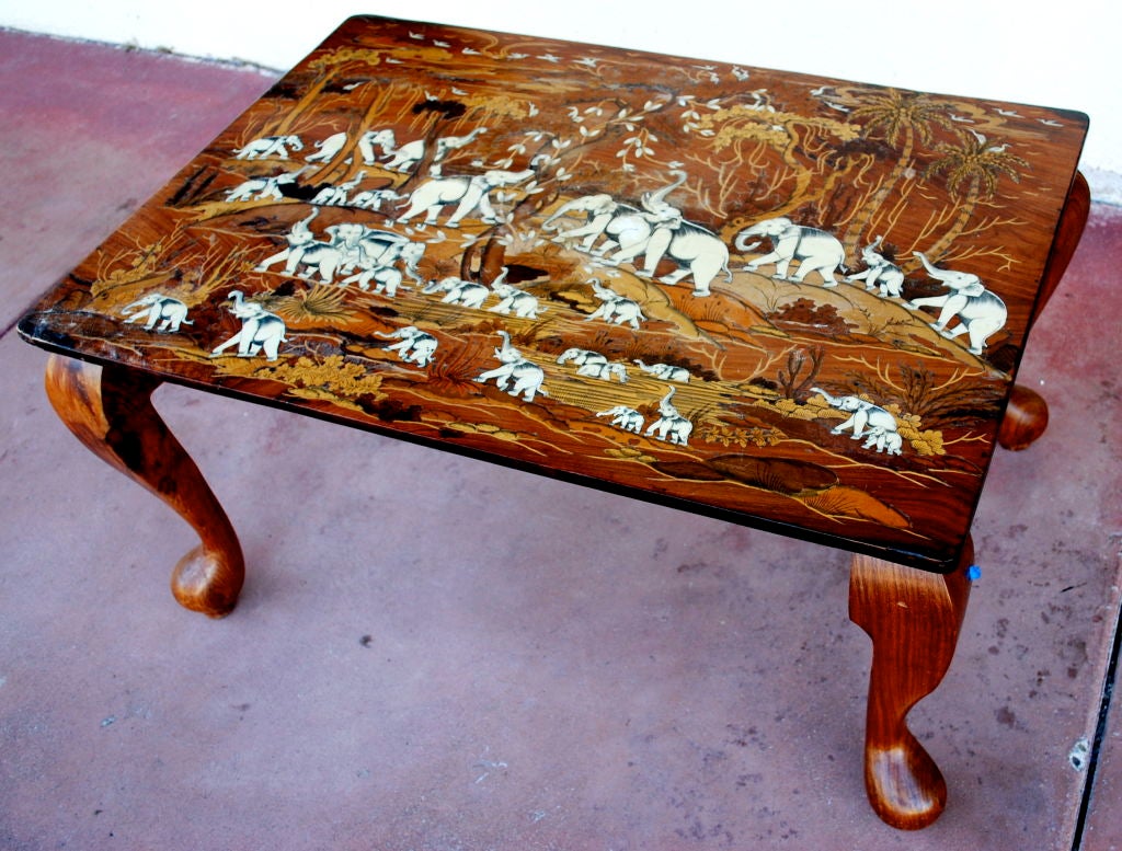 Beautiful intricate coffee table with Elephants playing on a hillside.














Haskell Antiques-Specializes in rare 16th, 17th, 18th Century Italian, Spanish, French, Syrian, Moroccan, French, Spanish Colonial, Anglo Indian,