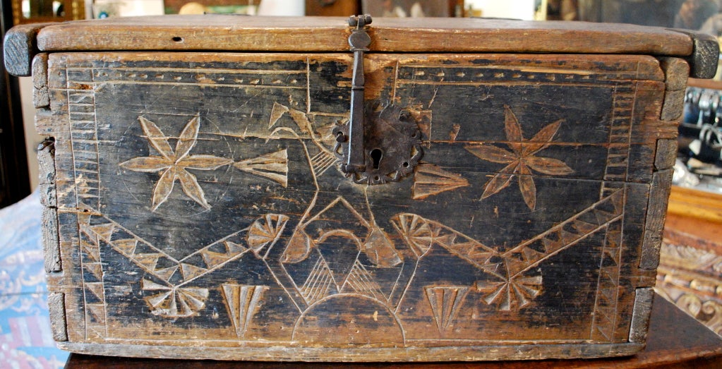 Ponderosa Pine. An extremely rare carved and painted chest with original hardware work. Carving is consistant with chests made at Taos Pueblo