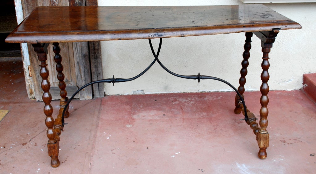 Beautiful 18th century Spanish single slab top table with iron bracing. Turned legs.
Haskell Antiques-specializes in rare 16th, 17th, 18th century Italian, Spanish, French, Syrian, Moroccan, French, Spanish Colonial, Anglo-Indian, Portuguese,