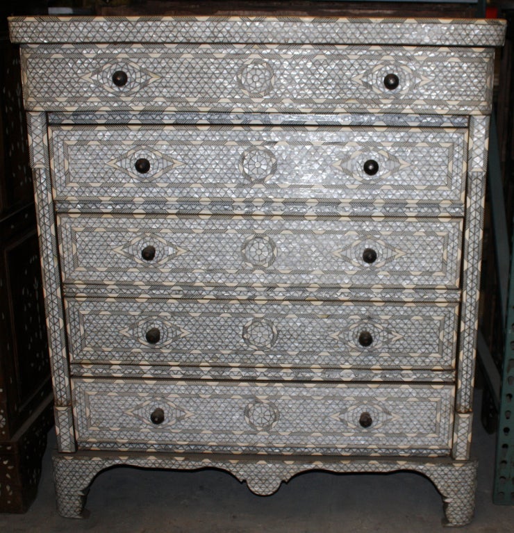 Beautiful Syrian Mother of Pearl Inlay dresser. Intricate inlay throughout with wood and Mother of Pearl pulls.

Haskell Antiques-Specializes in rare 16th, 17th, 18th Century Italian, Spanish, French, Syrian, Moroccan, French, Spanish Colonial,