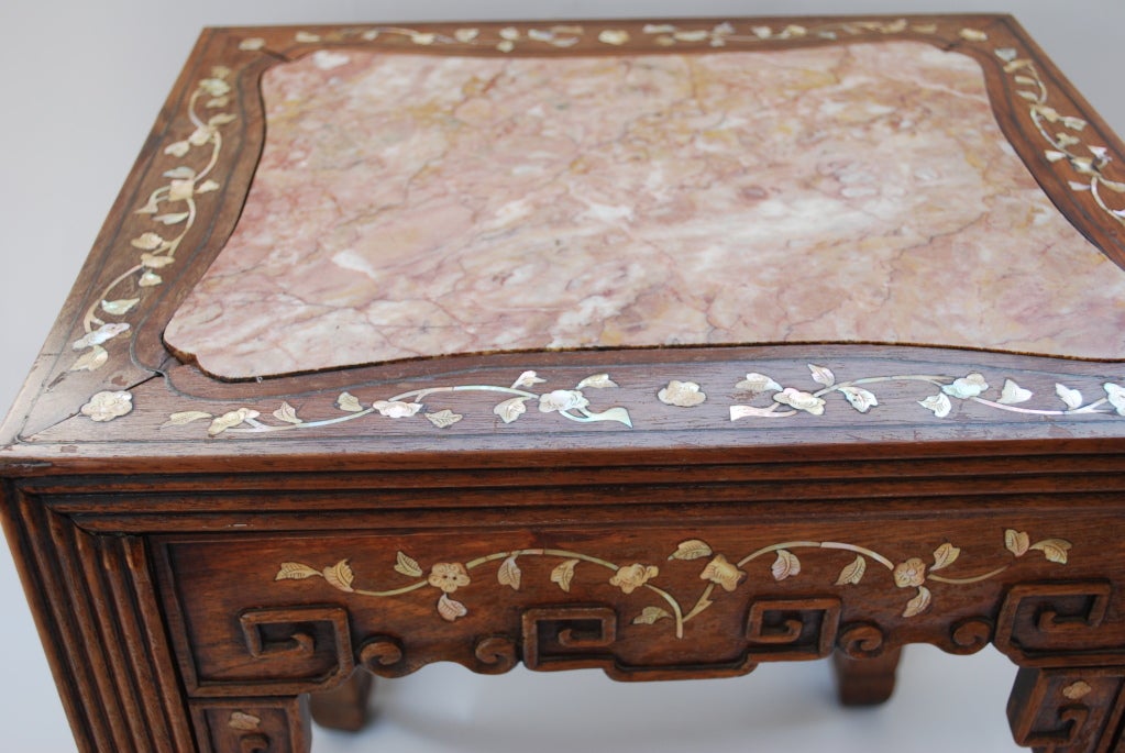 Nice 19th Century Chinese Mother of Pearl inlay plant stand with a marble top.