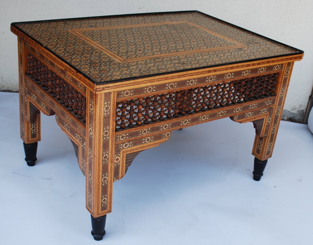 Inlay beautiful coffee table. Geometric designs throughout the top and side.
