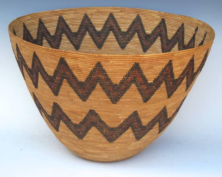 Large very fine Yokuts basket in pristine condition. Serrated design on exterior and interior.