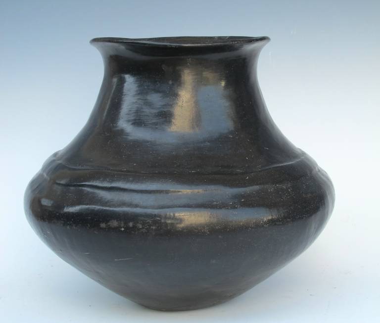 Beautiful Santa Clara blackware pot. Stunning design and patina. Circa 1895.