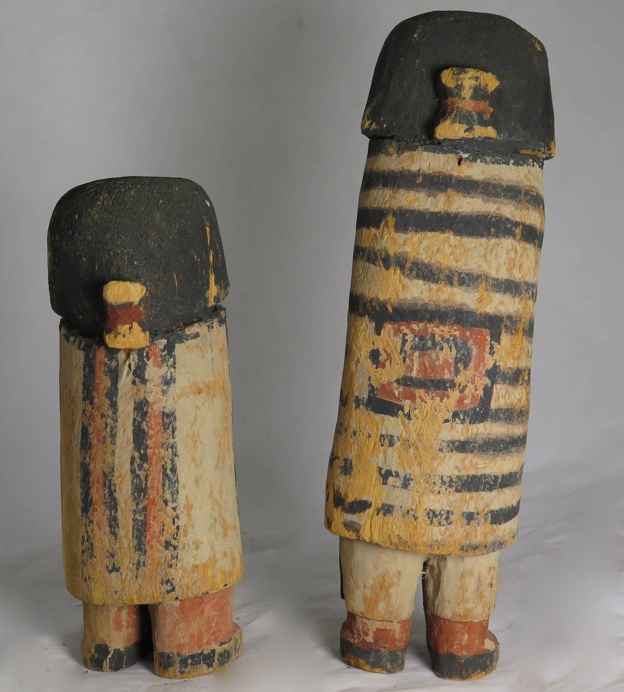 These two figures represent Hopi personages or chiefs. One wears a second phase chiefs blanket, the other a hopi style blanket. They date from circa 1890-1910. They were purchased from a Los Angeles dealer Ralph Altman in the 1950s. These secular