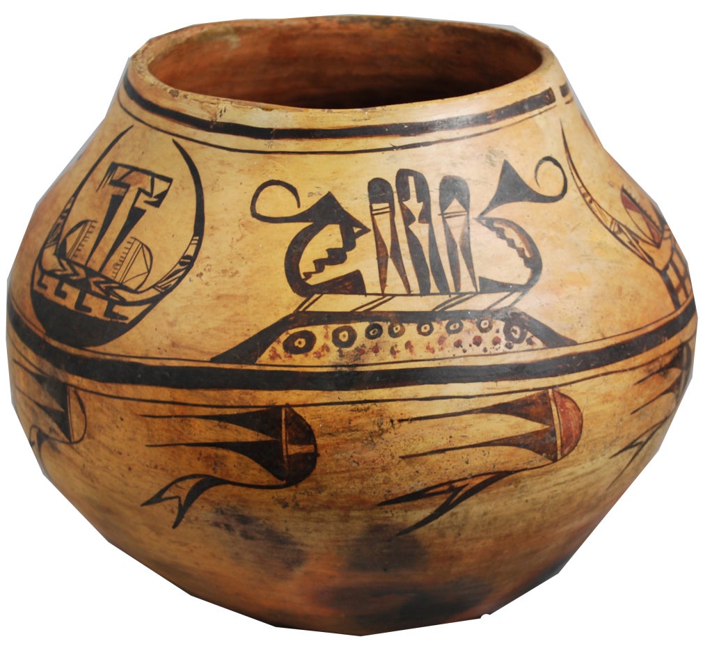 Rare and very large Hopi water jar circa 1880. Polychrome design incorporates avian and perhaps spiritual representations.