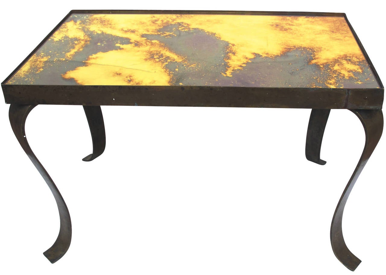Arturo Pani table with gold mirror top.