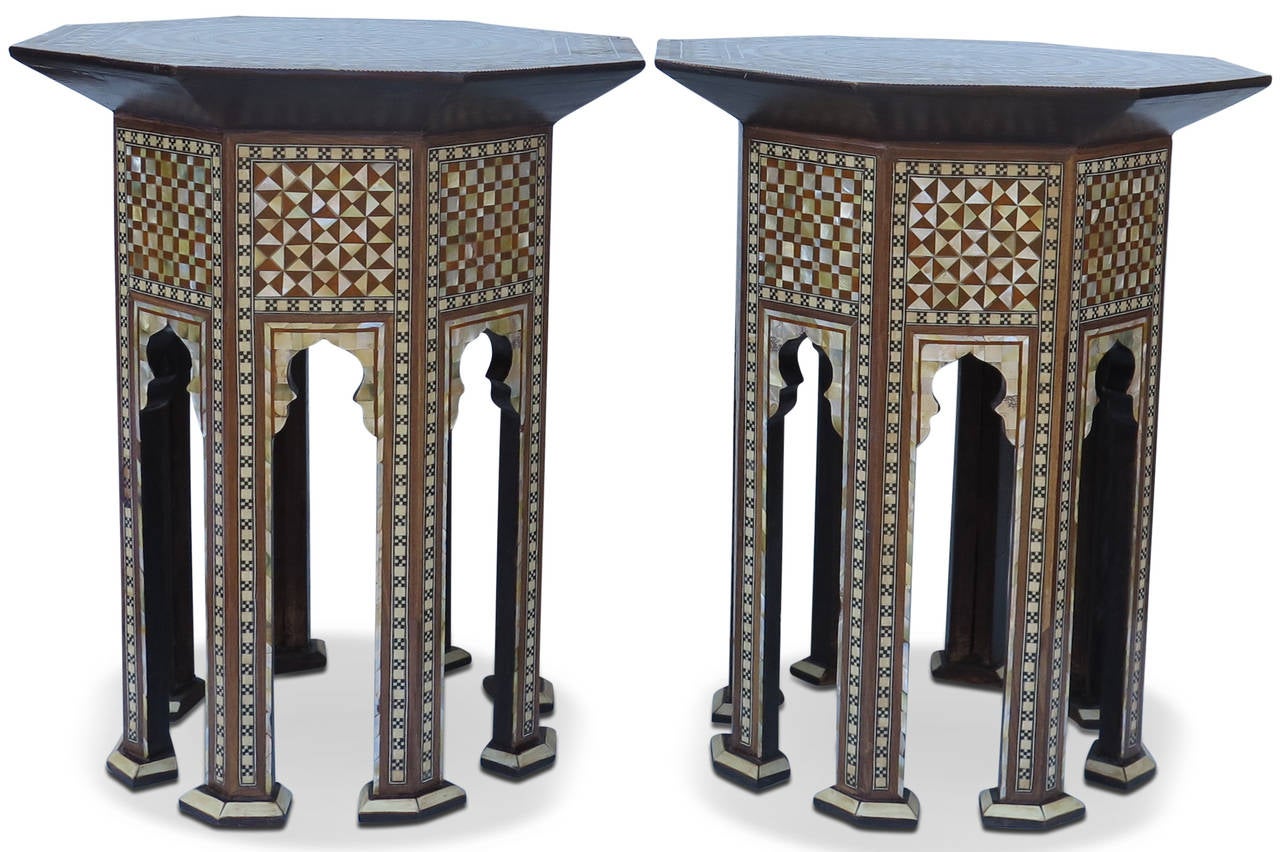 Beautiful pair of inlay tables with intricate mother-of-pearl and wood inlay throughout. Exceptional condition.