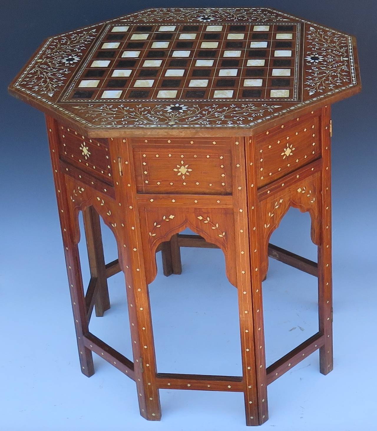 Beautiful, rare, early Anglo Indian folding table with checker board inlay pattern table.