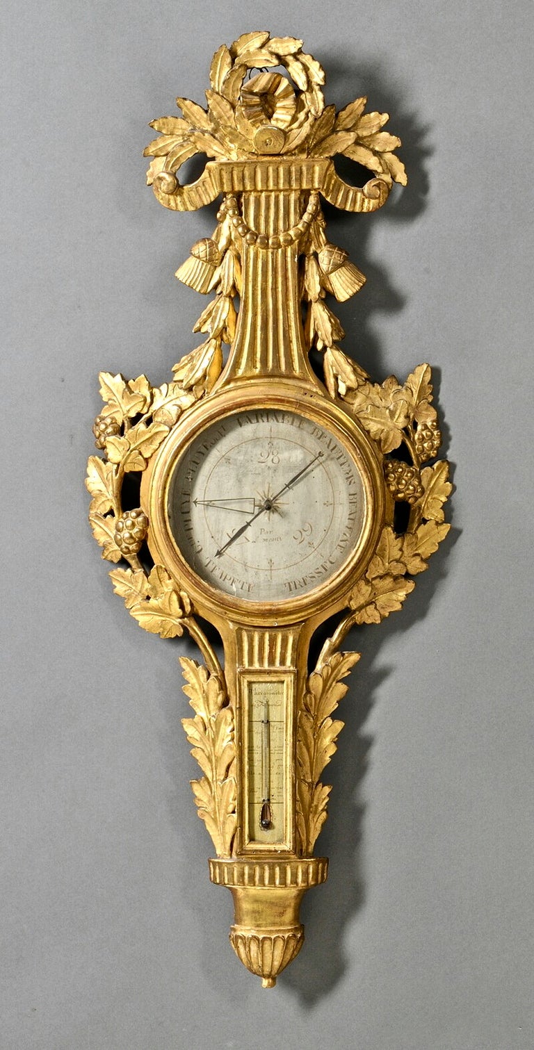 Louis XVI Period Giltwood Barometre
--painted dial signed by L. Monty