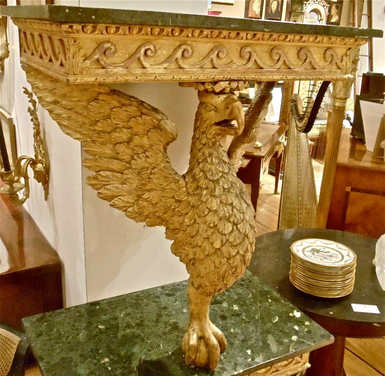 Pair of Period 18th Century Gilt Eagle Console Tables with Marble Tops

--Strong Carved Monopod Eagle with Talon Holding Ball, Outstretched Wings Supporting Well Executed Frieze with Running Dog Motif and Egg and Dart Molding