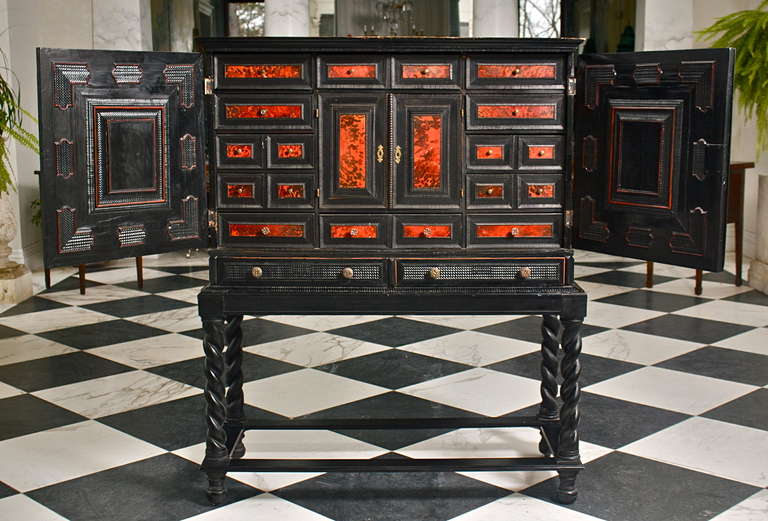 Exquisite Flemish or Italian Vargueno in Pure Baroque

-- Ebony with Tortoise Shell Inlays
-- Classical Fitting with Architectural Elements all Original
-- Multiple Drawers and Secret Compartments as Shown
-- On Turned Legged Stand