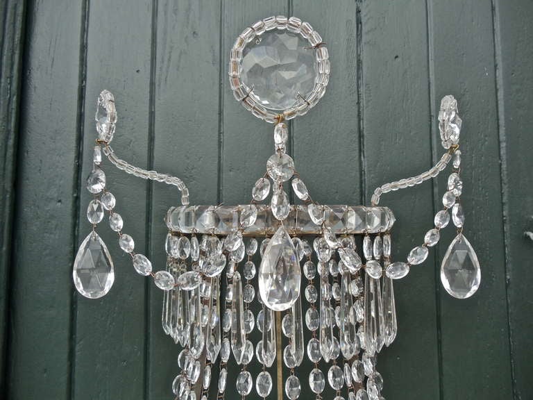 Pair of Swedish Nineteenth Century Wall Sconces

--Original Crystal 
--Neoclassical in Form
--Three Arms with Round Crystal Appliques
--Bronze Frame

 