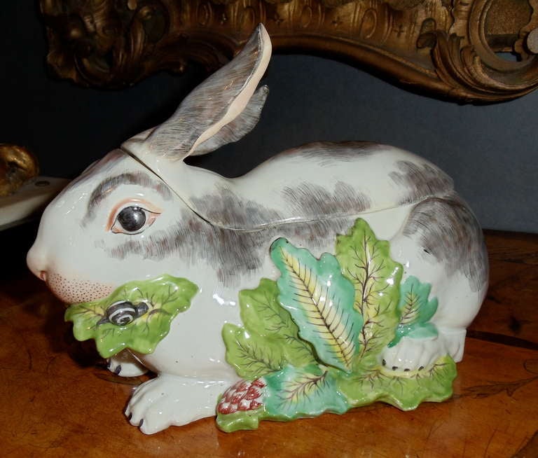 Nineteenth Century Hard Paste Porcelain Rabbit Tureen

-Possibly Samson bearing the Gold Anchor Chelsea Porcelain Mark

-Realistically modelled with Bunny eating kale, and a snail on leaf

-French or English