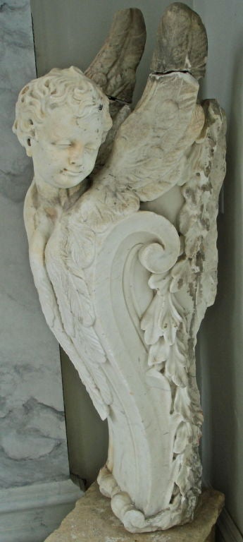 Important Pair of German Baroque Carved Marble Corbel Brackets.  Influenced clearly by Bernini yet representative of the full German Baroque tradition.  Angel figures, one of a youth, one of an adolescent.