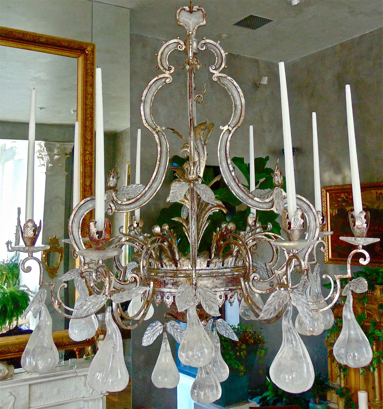 Worked and Silvered Iron and Rock Crystal Chandelier

--In Style of Maison Bagues, Mid-Century
--Cage Form Issuing 8 Scrolling Arms
--Realistic 9 inch Carved Rock or Quartz Crystal Pears and Leaves
--Magnificent Form

--Identical and From the