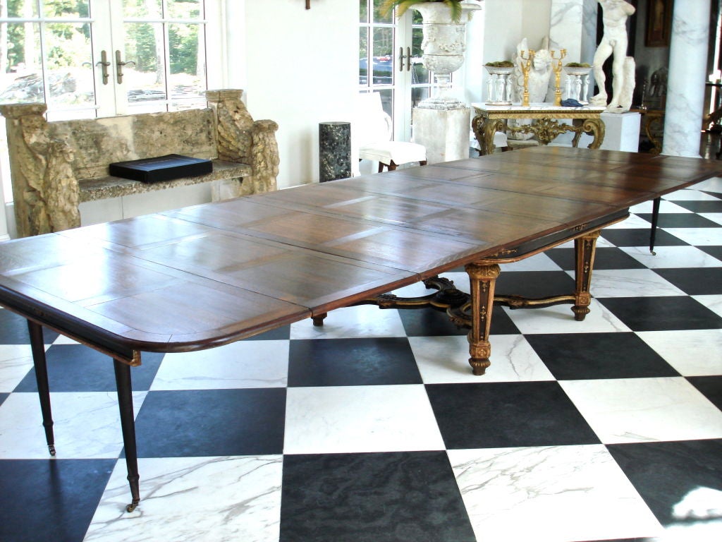 Late 19th Century Regence Style Extension Dining Table of Banquet Size.  Purchased from the Duke Foundation.  Exquisite Regence Form with Ten Original Leaves.  Originally from the Duke house, Roughpoint in Newport, probably the Vanderbilt Table. 