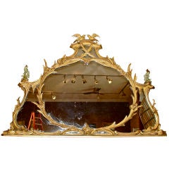GEORGE III CARVED AND GILTWOOD OVERMANTLE MIRROR