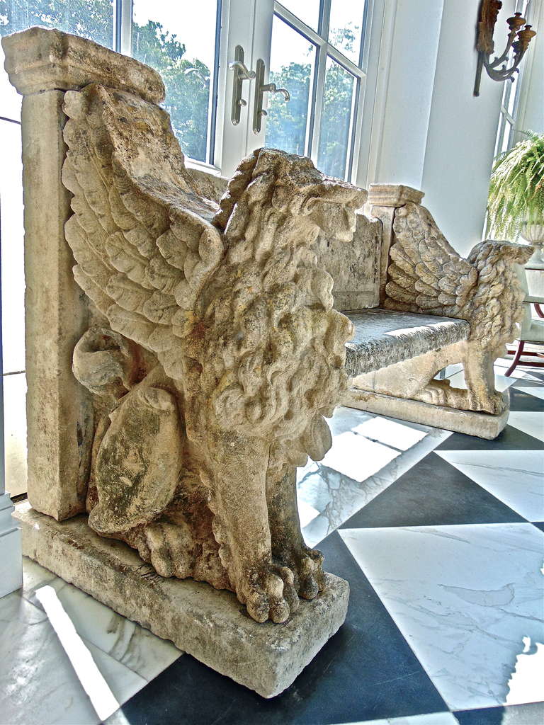 Monumental 19th Century Griffin Rest Carved Stone Bench

--Full Relief Winged Lion or Griffin Forms as Sides and Rests
--Detailed Carving
--Roman Form as Typical of Late Period William Kent Inspired
--Restorations and As Seen
--Ex Collection: 