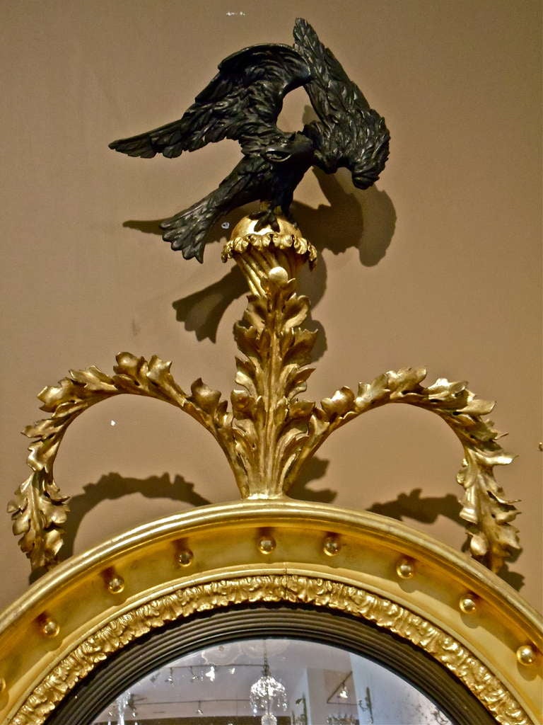 Carved Rare Pair Of English Regency Convex Mirrors With Eagle Pediments