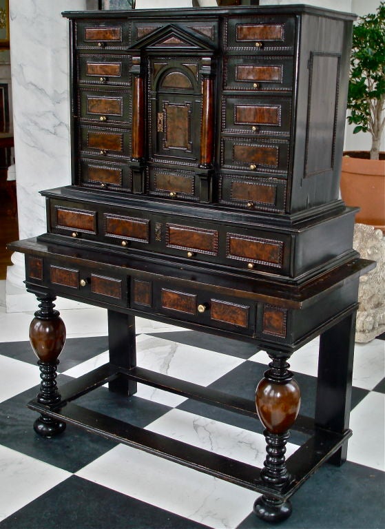 Period Flemish Ebony and Burl Vargueno Cabinet on Original Stand.  Multiple Drawers and Hidden Drawers Used for Storage of Valuables and Jewels.  Rare and Stylish.
