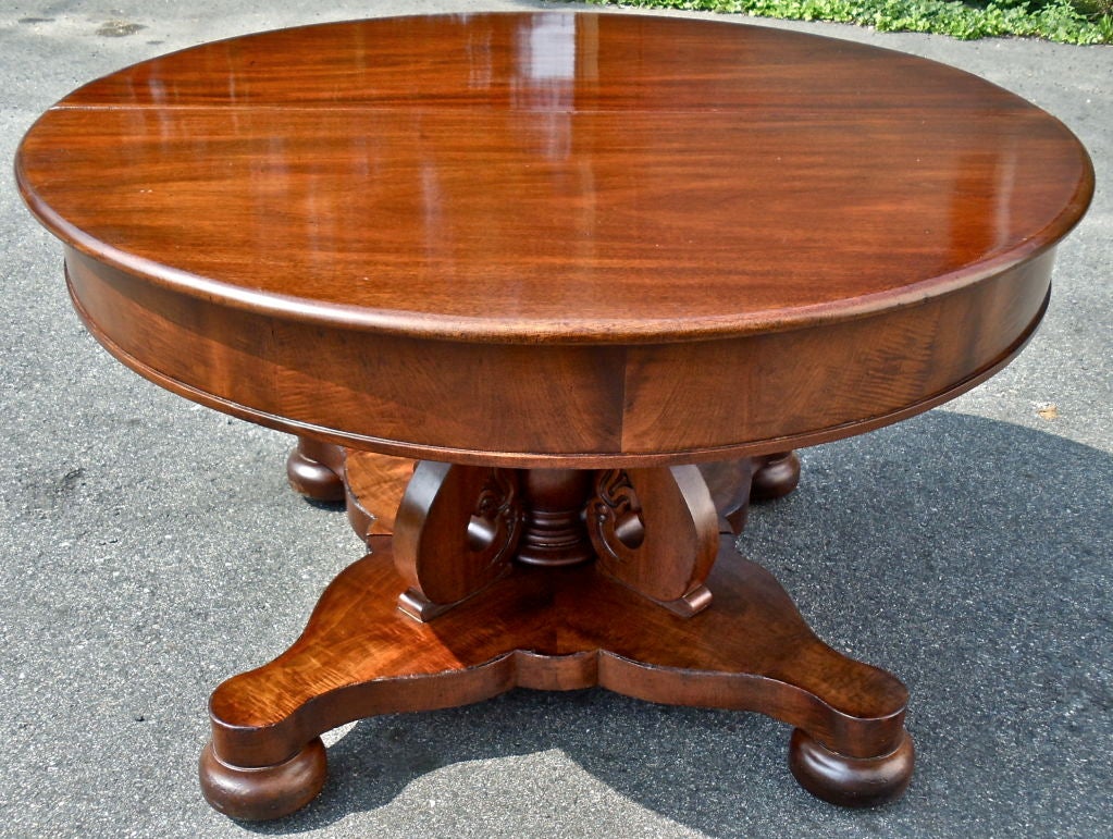 Period American Dining Table.  Begins as Round and Extends with Three Original Leaves.  Interesting Base Design and Original Middle Leg Support.  Most Likely New England States, Probably New Hampshire Origin
