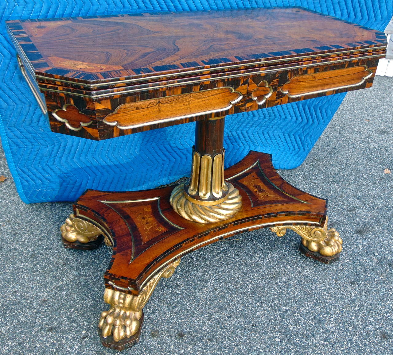 Exquisite Regency Calamander Wood Games Table with Fine Choice of Exotic Woods, Brass Neo-Gothic Framing and Original Gilded Elements

--All original and intact
--The construction, choice of Indian and Himalayan woods together with slight style