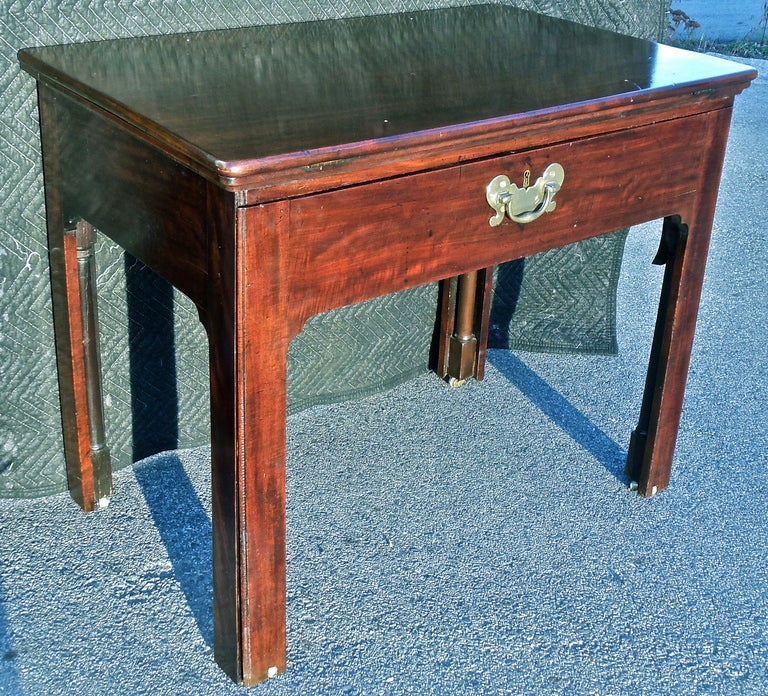 Period Georgian Mahogany Architect's Table.  In closed position it is a side or center table.  Then it becomes a reading or drawing stand, desk and even a stand up drawing or reading table.

Amazing Georgian piece from the Age of Enlightenment when