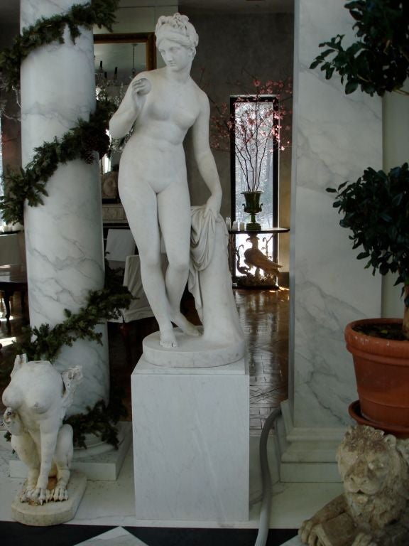 Carved Marble Venus Statue. Neoclassical Contraposto pose of nude female holding apple.  The quality of its execution, the age and dimensions would indicate this sculpture having been produced by the Marble Studio of Bertel Thorvaldsen.

Bertel