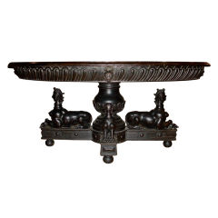 Amazing Baronial Ebonized Center Table with Sphinxes