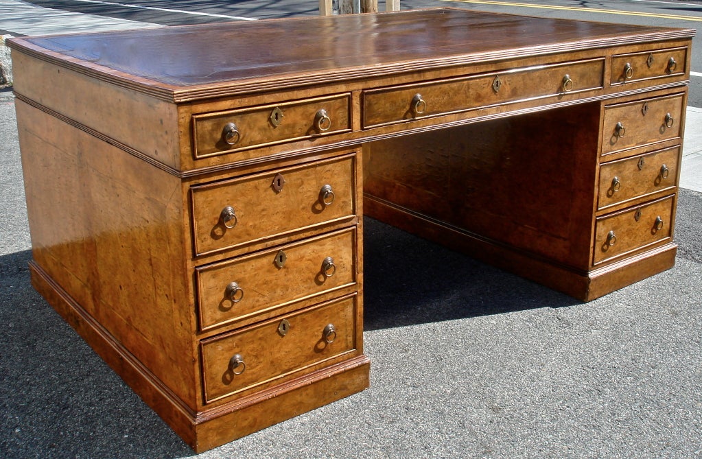 Stylish Figured Walnut Burl Edwardian Period Partners Desk.  Drawers in Frieze on All Sides, Drawers on Pedestals on One Side, File Cabinets on Other Side of Pedestals.  Exquisite walnut figuring and original brown tooled leather writing surface