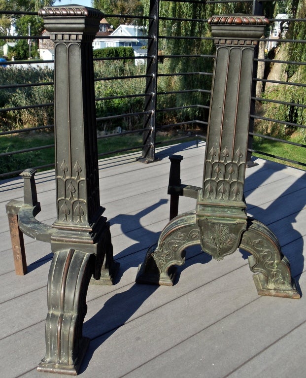Pair of Large Scale Arts and Crafts Bronze Andirons.  Original Patina.  Spade Motif.  Pine Branch in Profile at Bottom.  Amazing Quality and Period Sophistication