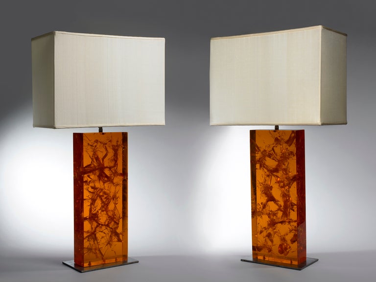 A very unusual pair of French mid 1970's Amber Lucite block lamps by Marie-Claude de Fouquieres.