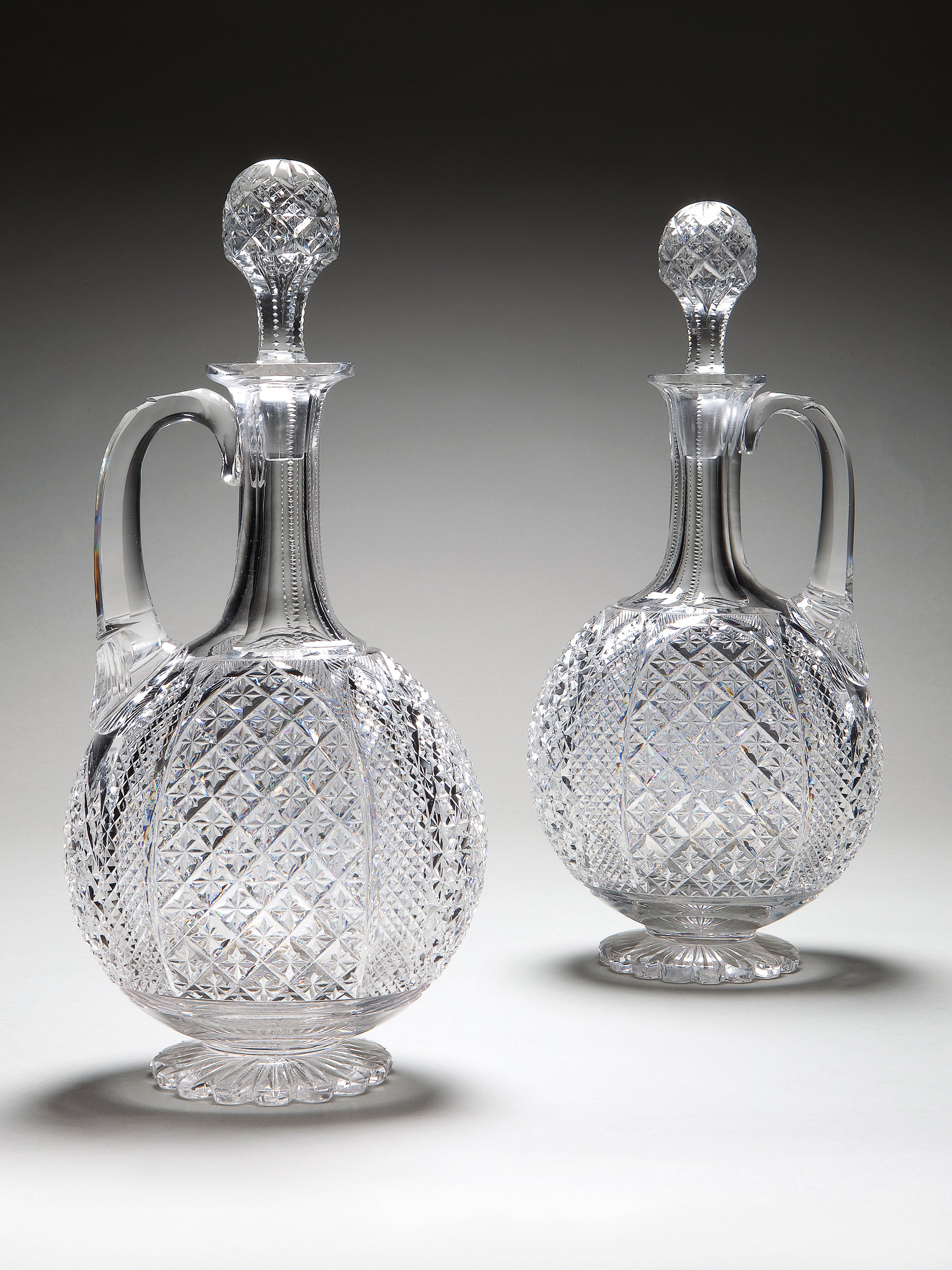 A Pair Of Cut Glass Decanters