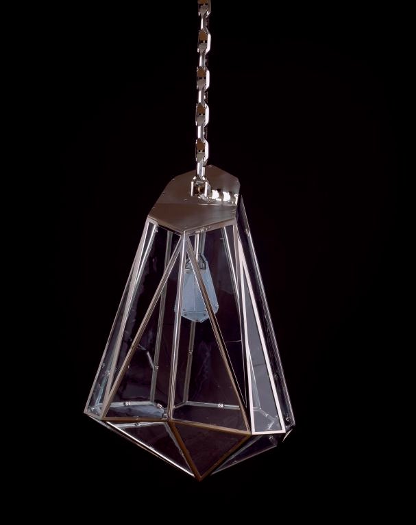 Diamonds Are a Girl’s Best Friend 1 - takes the traditional hanging lantern and transforms it into a symphony of glass and paktong, an ancient non-tarnishing metal with a seductive golden hue, half way between gold and silver. The lantern is made up