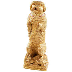 A Louis Philippe Carved Giltwood Spaniel