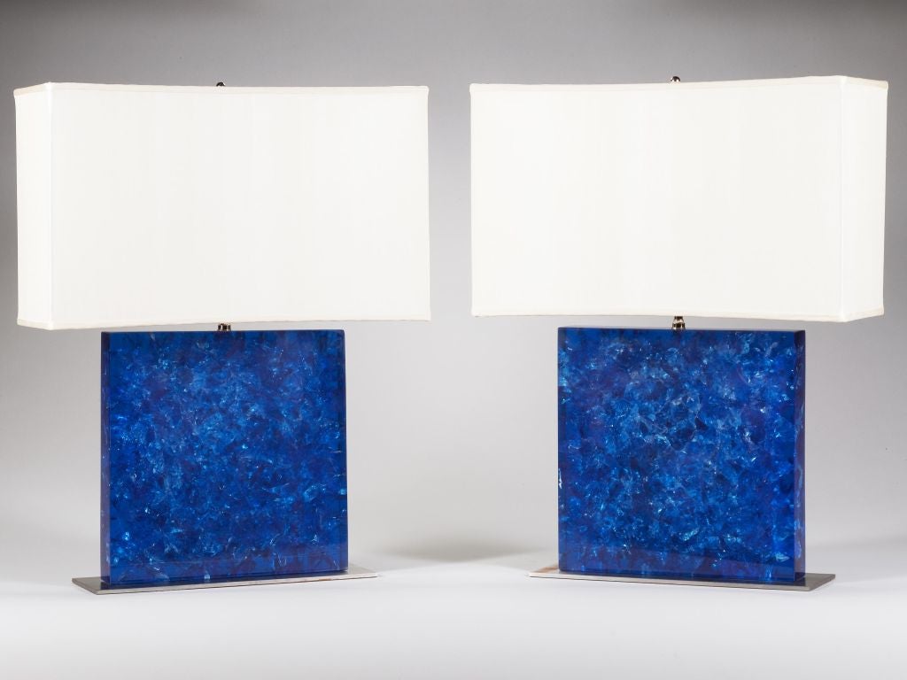 A very unusual pair of lucite block lamps fashioned to simulate crystal, by Marie Claude de Fouquieres.<br />
<br />
Fouquieres was one of the few Parisian pioneers who created furniture and decorative objects in resin and lucite, often purposely